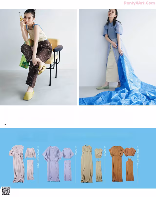 A woman sitting on a chair in front of a blue sheet.